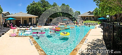 Panoramic view resident pool party event at apartment complex near Dallas, Texas Editorial Stock Photo