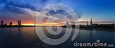 Panoramic view of Riga Skyline and Daugava River at sunset - Riga, Latvia Editorial Stock Photo