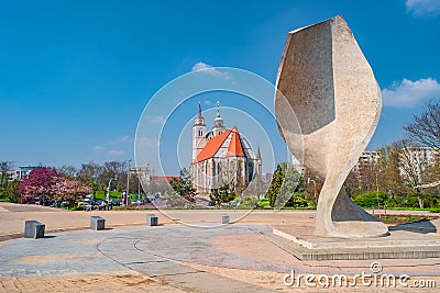 Panoramic view of river Elbe bank, Johannis church, parks and Monument of Peoples Friendship in Magdeburg, Germany Editorial Stock Photo