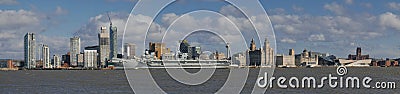 A panoramic view of the Royal Navy`s Prince of Wales aircraft carrier, moored at the historic, UNESCO listed Liverpool waterfront Editorial Stock Photo