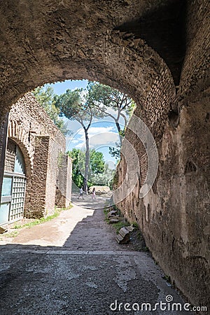 Panoramic view of the ruins of the forum of the time of the Roman Empire, with tourists visiting it Editorial Stock Photo