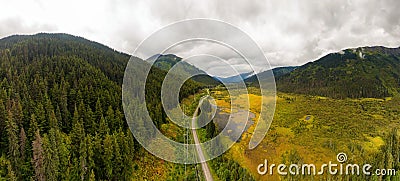 Panoramic View of Scenic Road surrounded by Mountains in Canadian Nature Stock Photo