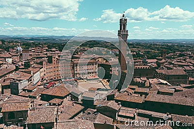 Panoramic view of Siena city with Piazza del Campo and the Torre del Mangia Stock Photo