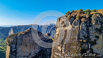 Panoramic view of steep canyons of rock formations of the complexes of Eastern Orthodox monasteries in Kalambaka, Meteora, Stock Photo