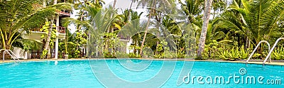 Panoramic view of sunny tropical hotel Stock Photo