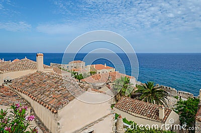 Panoramic View of Traditional House Rooftops in Medieval Castle Town of Monemvasia. Deep Blue Sea and Sky in the Horizon. Editorial Stock Photo