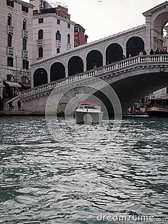 panoramic view of a Venice canal with water taxi Editorial Stock Photo