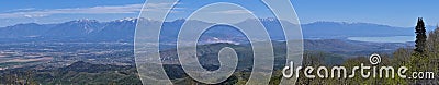 Panoramic view of Wasatch Front Rocky Mountains from the Oquirrh Mountains, by Kennecott Rio Tinto Copper mine, Utah Lake and Grea Stock Photo