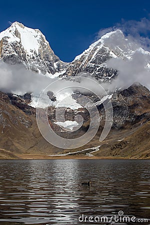 Panoramic View from the western end of Lagona Carhuacocha to Mount Yerupaja, Andes Mountains, Peru Stock Photo
