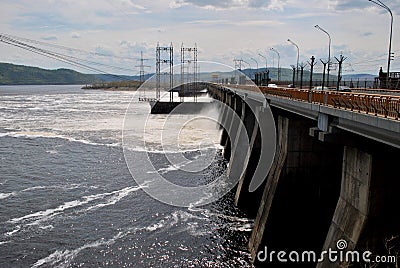 Panoramic view of the Zhigulevskaya hydroelectric power station during the spring discharge of water. Editorial Stock Photo