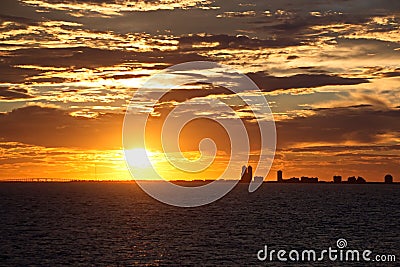 Panoramic views of the coast of the city of Brownsville, USA in the daytime and in the evening in the red rays of sunset. June, 20 Stock Photo