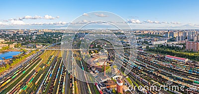 Panoramic wide view rail sorting freight station with various railway cars, with many rail tracks railroad. Aerial view heavy Stock Photo