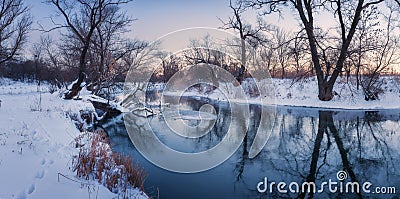 Panoramic winter landscape with trees, beautiful frozen river at Stock Photo