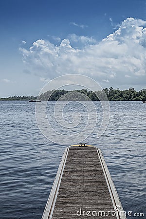 Panoramica of the Rio Zaire in Soyo with pontoon for boats. Angola Stock Photo