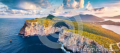 Panotamic view from flying drone. Great sunrise on Caccia cape. Breathtaking spring scene of Sardinia island, Italy, Europe. Fanta Stock Photo