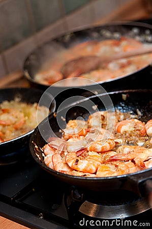 Pans of Cooking Shrimp Stock Photo