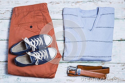 Pants, shoes, shirt and belt on white vintage background Stock Photo