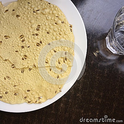Papadum bread on a plate Stock Photo