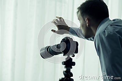 Paparazzi with camera Stock Photo