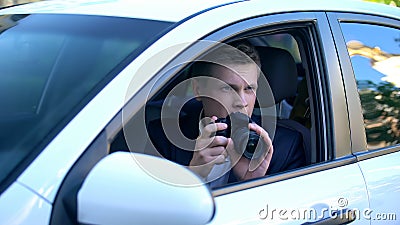 Paparazzi doing photo of celebrity from car, professional photojournalist Stock Photo