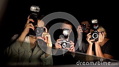 Paparazzi making shoots, pov of celebrity sitting in car, arriving to event Stock Photo