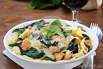 Papardelle with the chicken and with the spinach Stock Photo