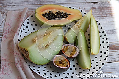 Fresh fruits, papaya, melon and passion fruit Stock Photo
