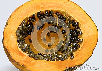 Papaya Seeds with there sweet orange fruity flesh used in Asian cultures has desserts Stock Photo