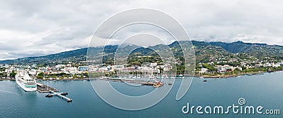 Papeete city, island of Tahiti, French Polynesia. Aerial view of city skyline, sea port and marine. Editorial Stock Photo