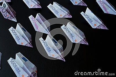Paper airplanes made of Euro banknotes, the concept of cash flow. Stock Photo