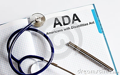 Paper with Americans with Disabilities Act ADA on a table Stock Photo