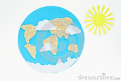 Paper application: planet earth, continents, clouds, and sun. isolate on a white background. Stock Photo