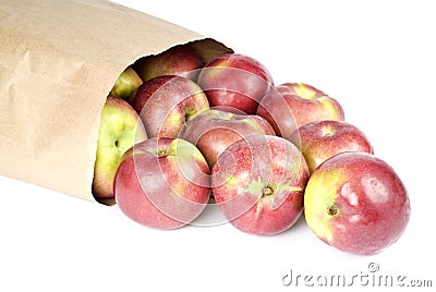 Paper Bag Full of Macintosh Apples on Its Side Stock Photo