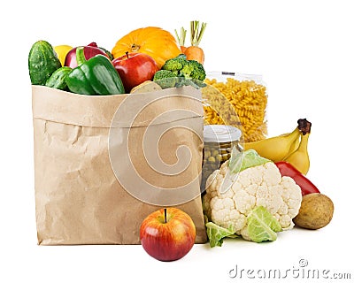 Paper bag with various food - fresh vegetables, fruits and bread Stock Photo