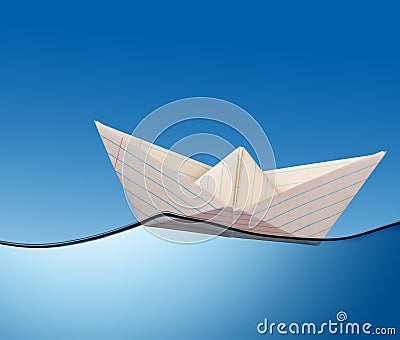 Paper boat on the ocean. Stock Photo