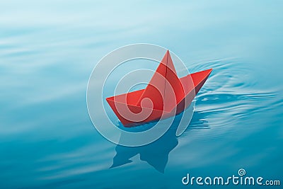 Paper boat sailing Stock Photo