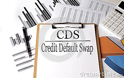 Paper with CDS - Credit Default Swap on a chart background, business Stock Photo