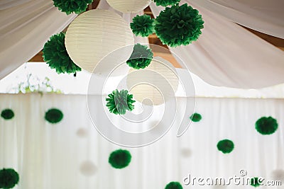Paper Chinese bells under the ceiling in the restaurant. Stock Photo