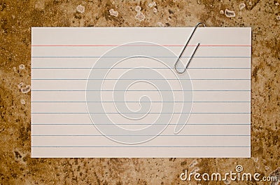 Paper clipped note card Stock Photo