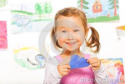 Paper cloud held by little girl Stock Photo