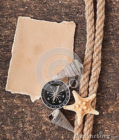 Paper, compass, rope and seashell Stock Photo