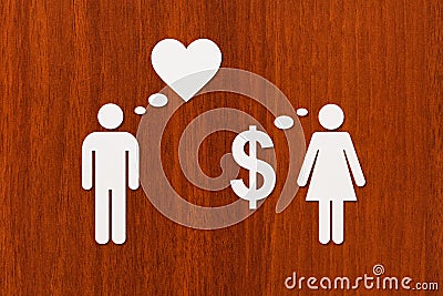 Paper couple, love vs money. Abstract conceptual image Stock Photo