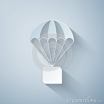 Paper cut Box flying on parachute icon isolated on grey background. Parcel with parachute for shipping. Delivery service Vector Illustration