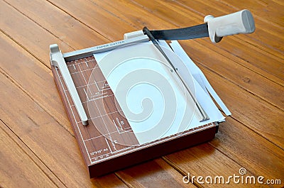 Paper Cutter cutting paper Stock Photo