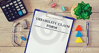 Paper with Disability Claim Form on the office desk Stock Photo