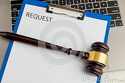 Paper document named request on the table. Stock Photo