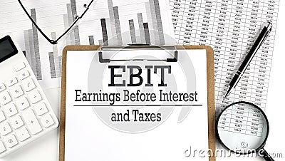 Paper with EBIT table on charts, business concept Stock Photo