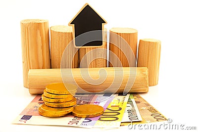 Paper euro money, wooden logs and gold coins Stock Photo