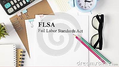 Paper with Fair Labor Standarts Act FLSA Stock Photo