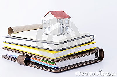 Paper house on Books stack Stock Photo
